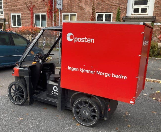 Fotoer viser en fire-hjuls lastesykkel som benyttes av Posten.